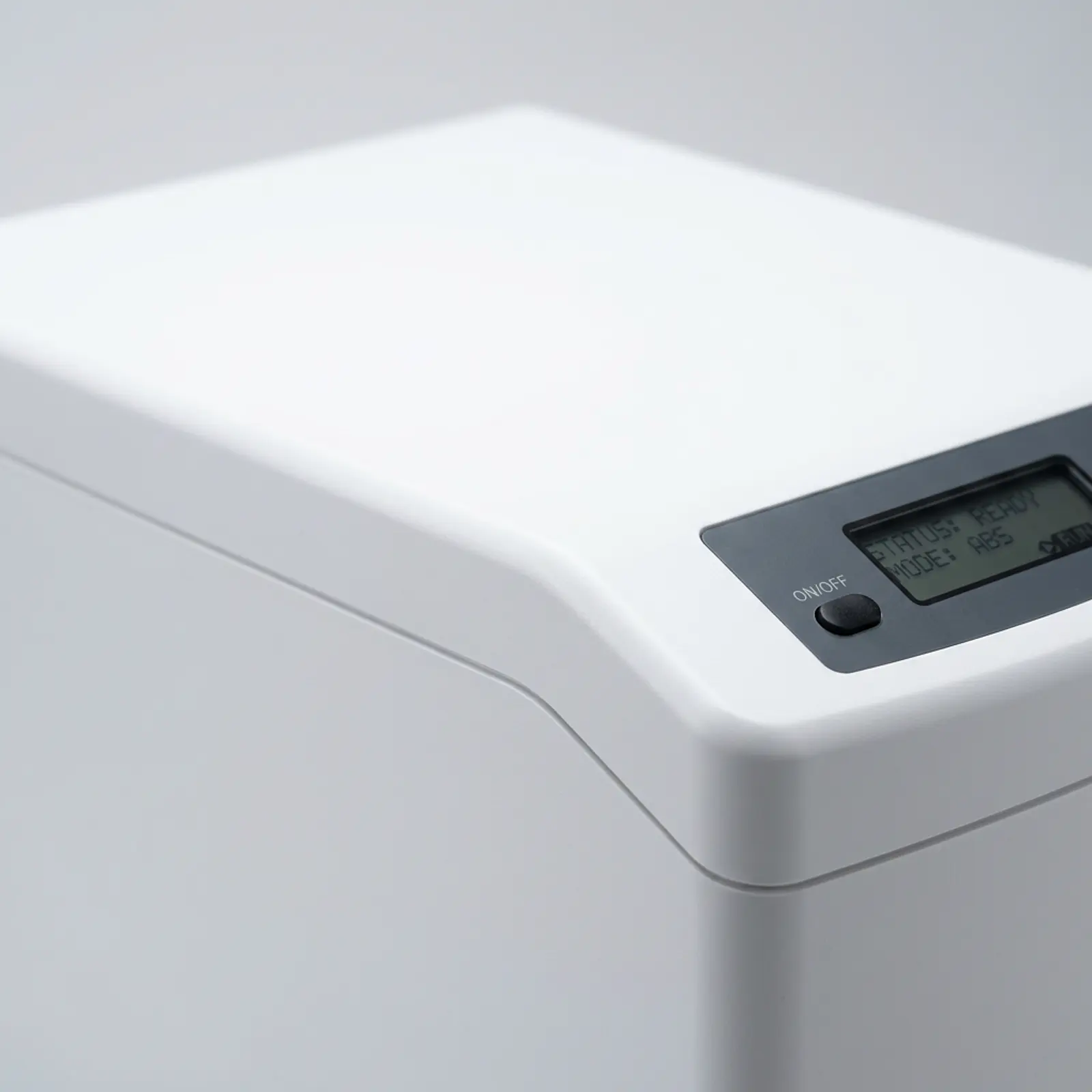 Close-up of a bright white plastic surface with a uniform, opaque color and a smooth finish.